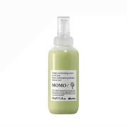Davines Momo hair serum bottle on a white background